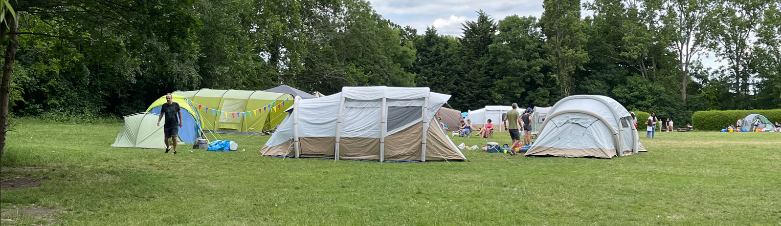 Tents in the main field at The Fort