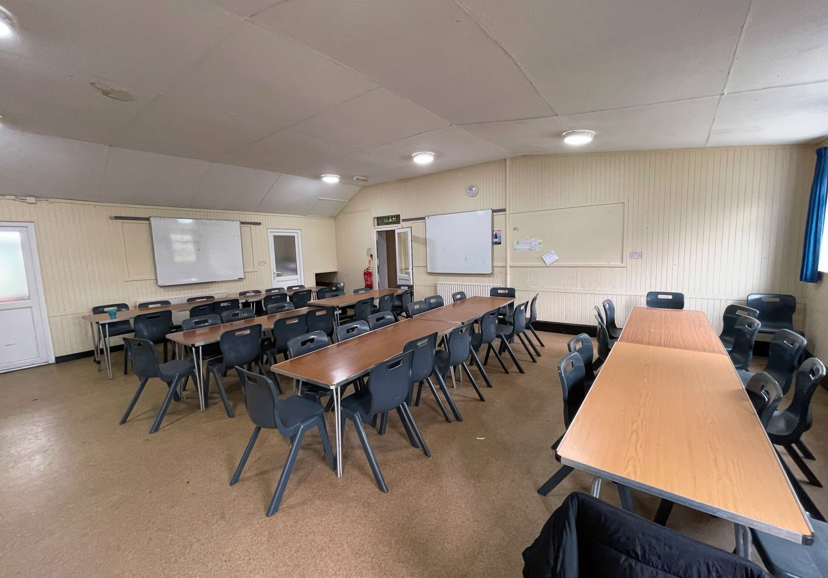 Sunley hall with tables and chairs