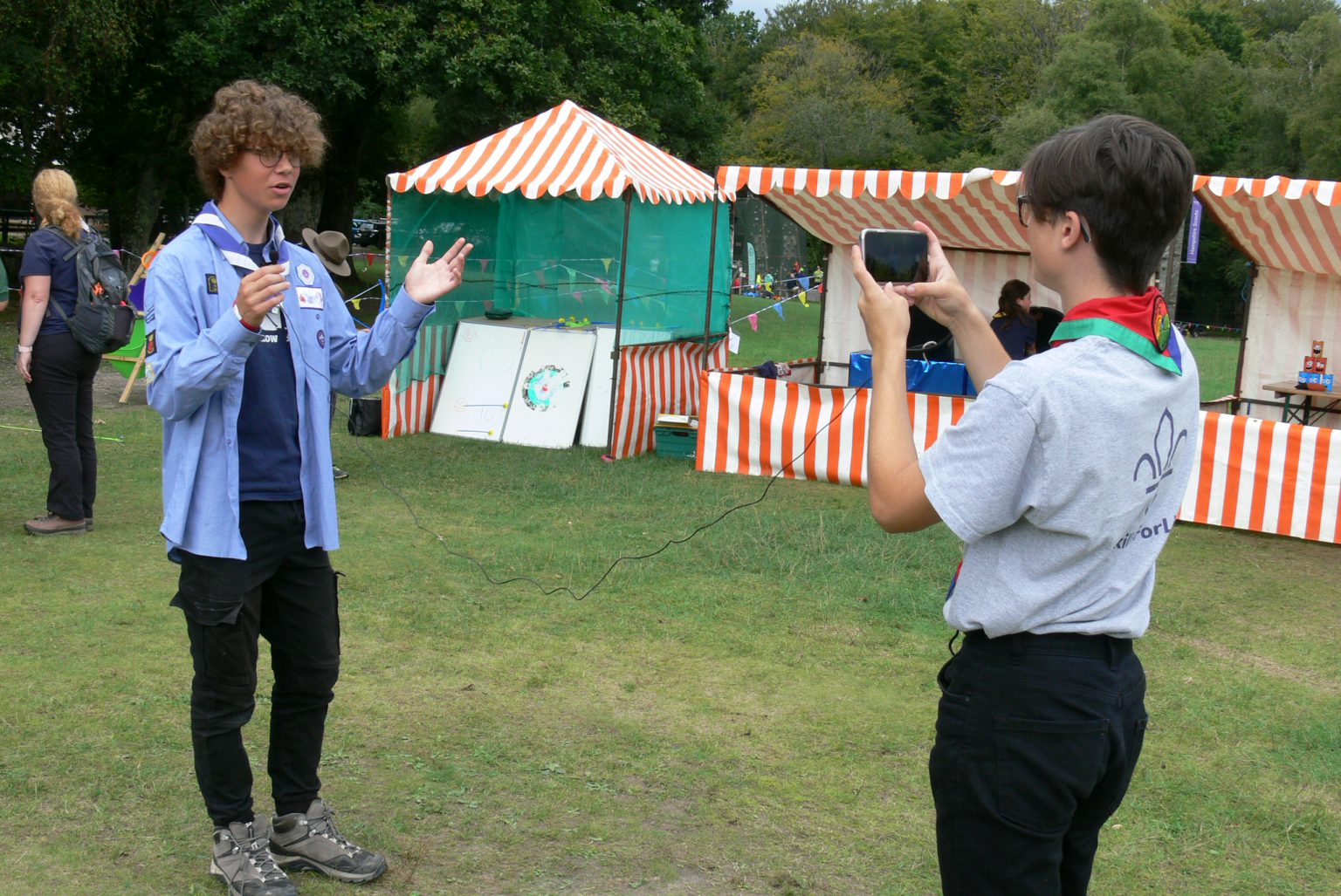 Scouts filming eachother with phones